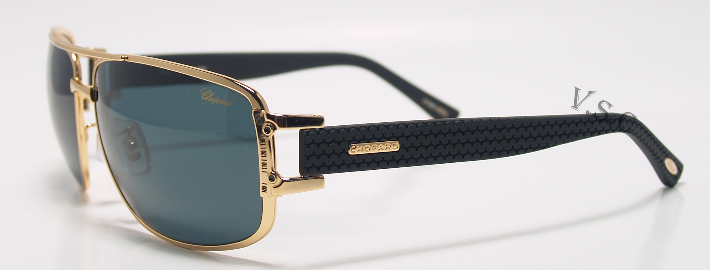  polarized green/gold black rubber